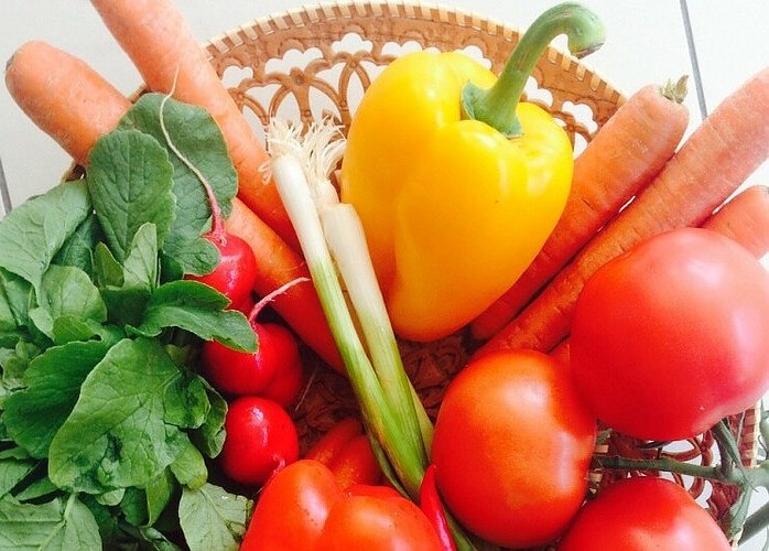 a gift basket filled with healthy whole foods from the garden